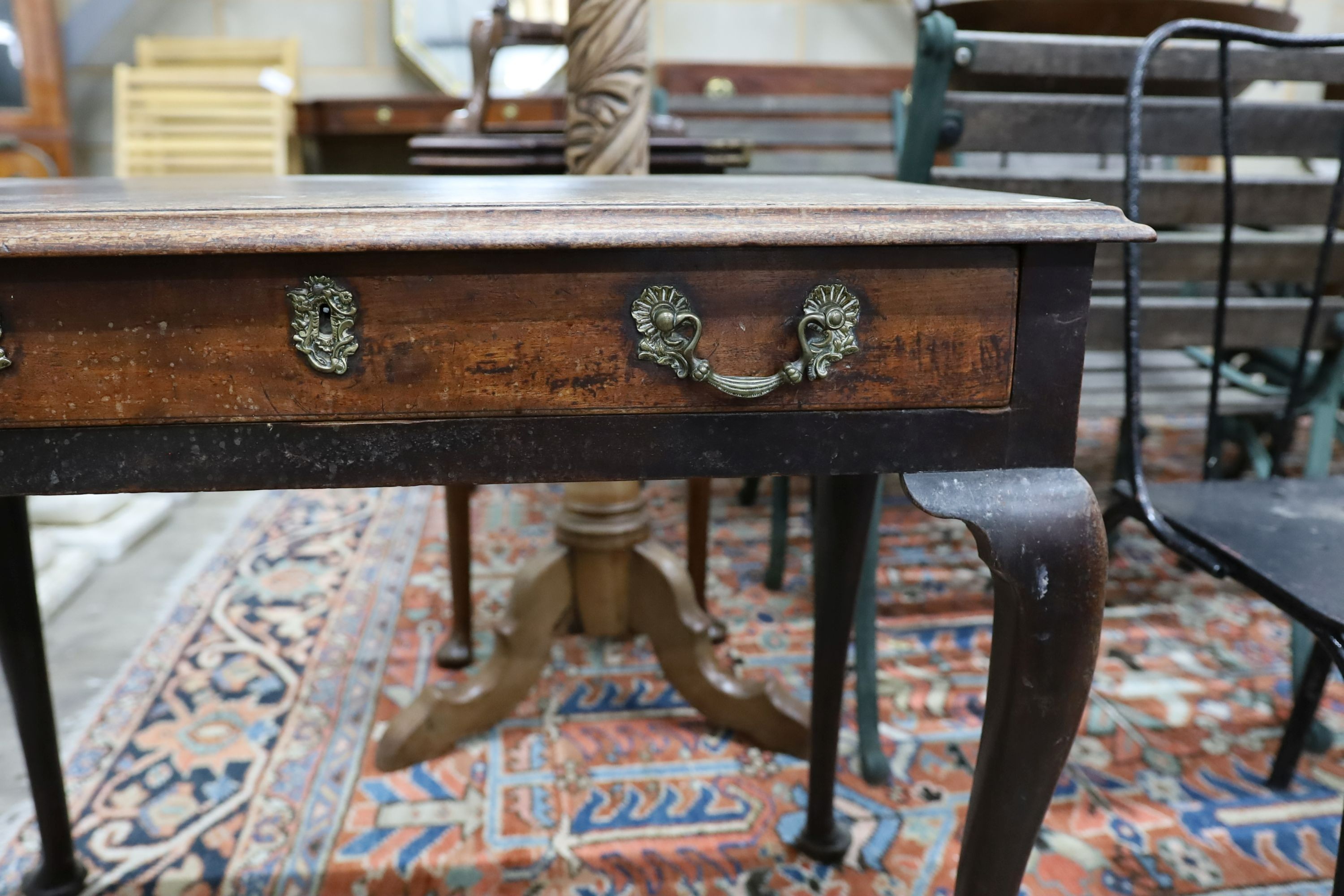 A George III mahogany side table, fitted with a single drawer, on cabriole legs, width 83cm, depth 48cm, height 67cm